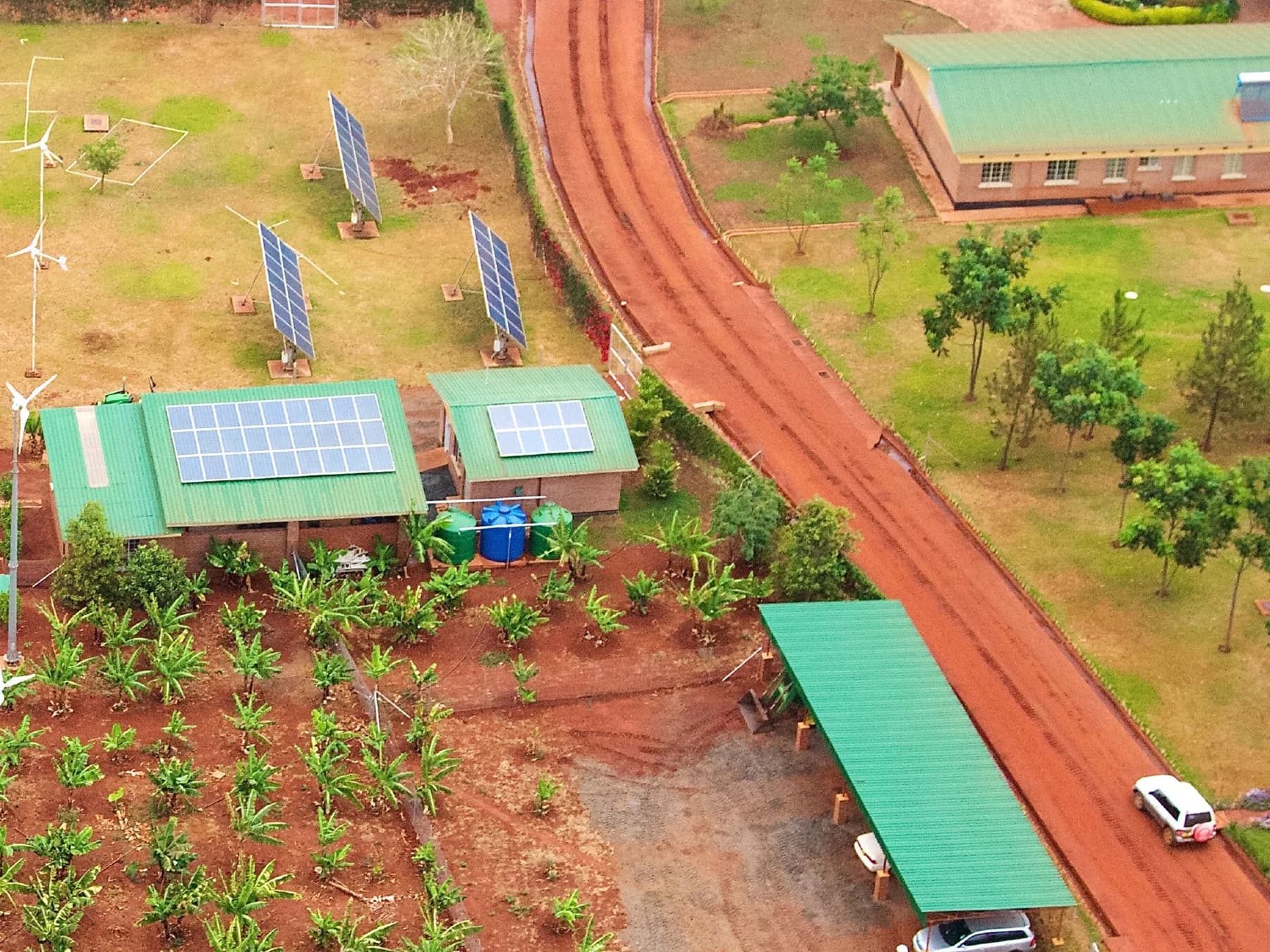 Aerial view of the existing Child Legacy International campus and agricultural plots in Msundwe, Malawi