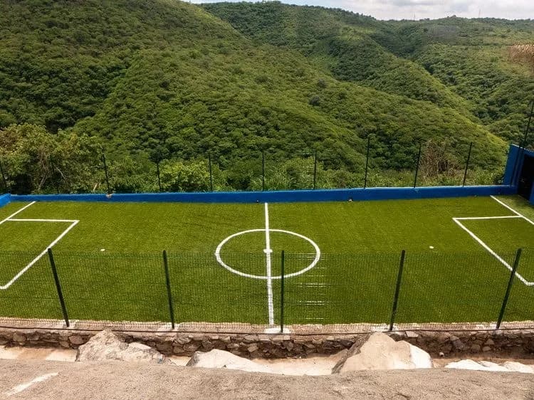 Horizon Mexico's soccer field overlooking the green Guadalajara gorge