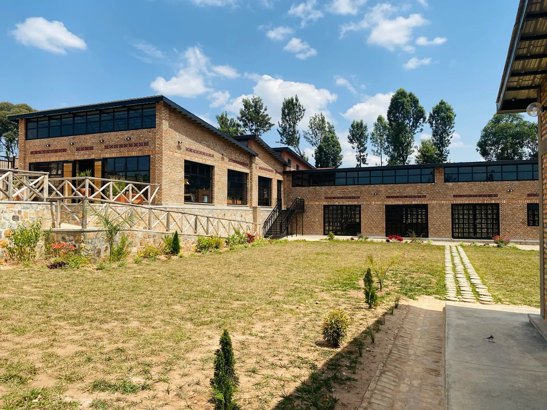 The completed Azizi Life Cultural Center exterior courtyard in Ruhango, Rwanda